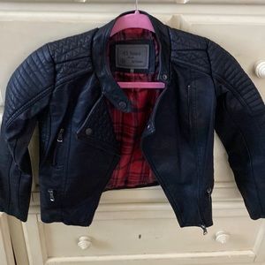 Imitation leather, polyester jacket . Size 8 girls. Never worn.